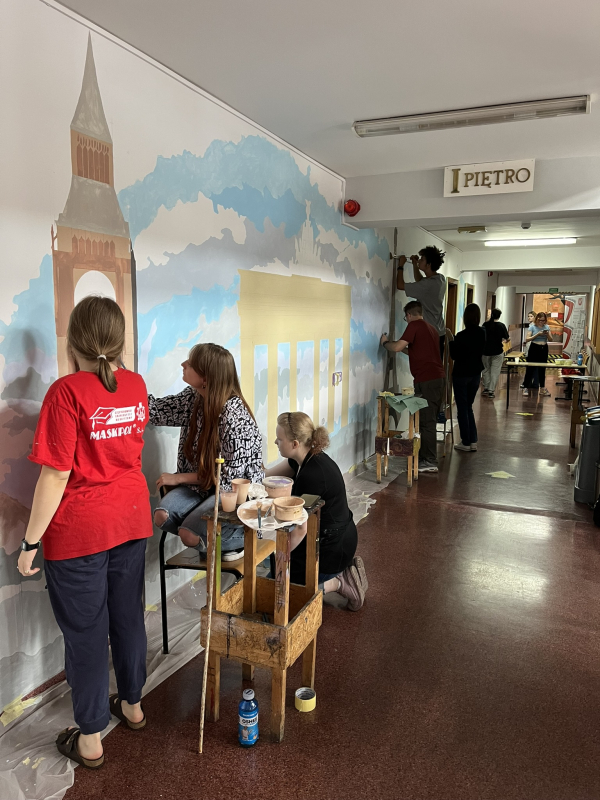 Students creating the mural