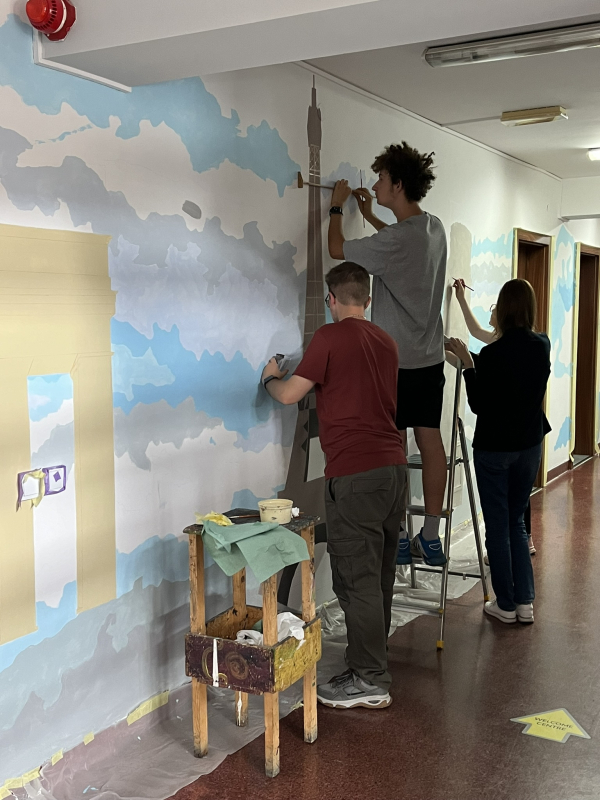 Students creating the mural